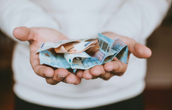 Photo by Christian Dubovan two Euro banknotes