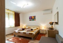 Advancements in Floor Coating Technologies: A Must-Know for Homeowners white and brown bed near brown wooden table