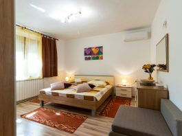 Advancements in Floor Coating Technologies: A Must-Know for Homeowners white and brown bed near brown wooden table