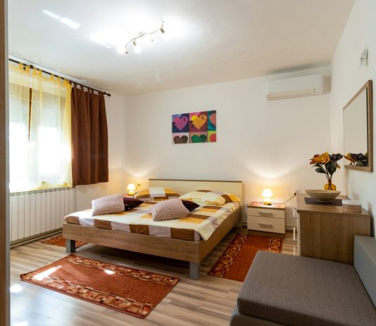 Advancements in Floor Coating Technologies: A Must-Know for Homeowners white and brown bed near brown wooden table