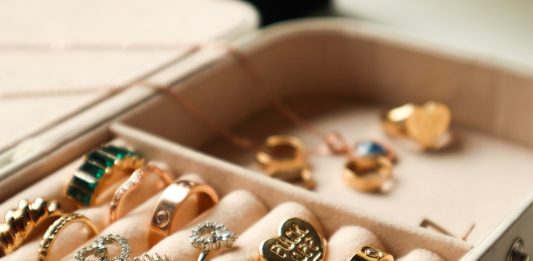 How to Style Union Jack Accessories for Any Occasion a box filled with lots of different types of rings