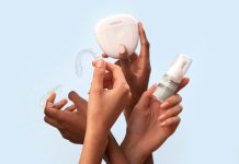 Making Dental Visits a Breeze: Creative Ways to Reduce Your Child’s Stress a group of people holding a white object in their hands