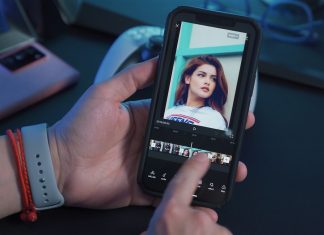 Using APIs to Integrate Video Hosting and Streaming in Headless CMS a person holding a cell phone with a picture of a woman on the screen