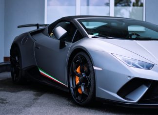 Do Exotic And Luxury Car Rental Accepts Debit Cards black porsche 911 parked on gray pavement