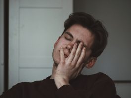 When Headaches Are More Than Just Stress man wearing black crew-neck top