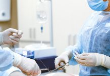 Medical Errors: Your Rights as a Patient Healthcare professionals in protective gear engaged in a surgical procedure.