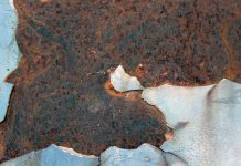 Legal Requirements for Disclosing Material Latent Defects a piece of metal that has been rusted