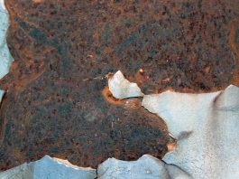 Legal Requirements for Disclosing Material Latent Defects a piece of metal that has been rusted