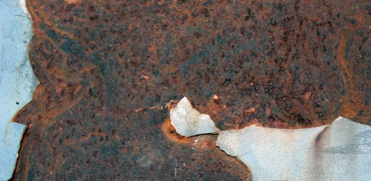 Legal Requirements for Disclosing Material Latent Defects a piece of metal that has been rusted