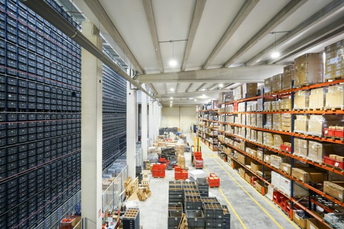 Photo by Alberto RodrÃguez a large warehouse filled with lots of boxes