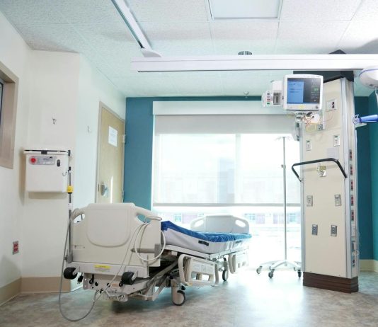 The Revenue Hospitals Lose Before a Claim Ever Reaches the Payer A well-equipped hospital room with a bed and advanced medical equipment.