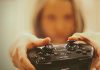 How Digital Gaming Communities Are Growing Worldwide person holding black sony ps 4 controller