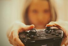 How Digital Gaming Communities Are Growing Worldwide person holding black sony ps 4 controller
