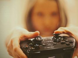 How Digital Gaming Communities Are Growing Worldwide person holding black sony ps 4 controller