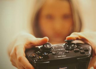 How Digital Gaming Communities Are Growing Worldwide person holding black sony ps 4 controller