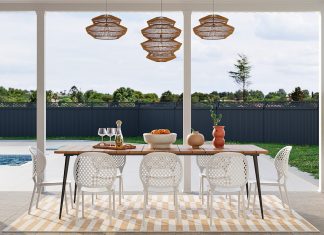 How To Match Your Home Layout To Your Lifestyle a dining room with a table and chairs next to a pool