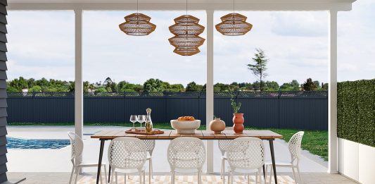 How To Match Your Home Layout To Your Lifestyle a dining room with a table and chairs next to a pool