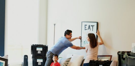 The Ultimate Checklist for Starting Fresh in a New City woman in blue denim jacket standing beside woman in black shirt